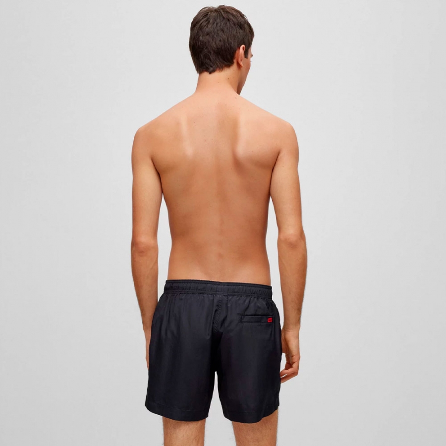 banador-etiqueta-con-logo-roja