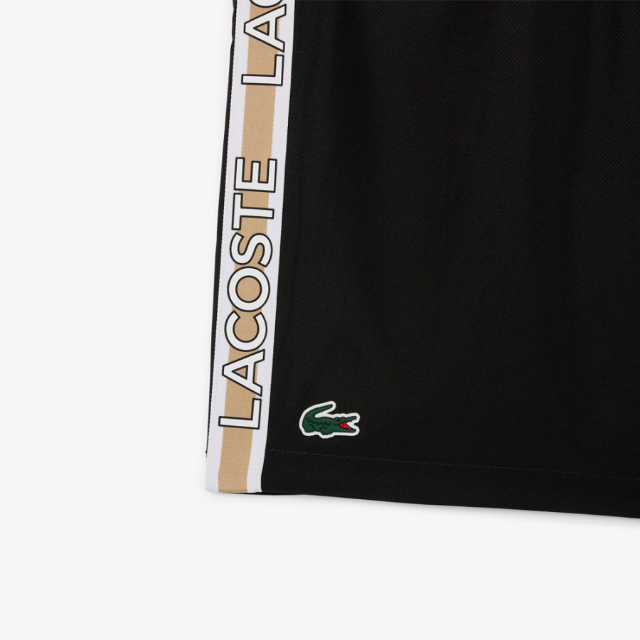 shorts-a-righe-con-logo-sportivo shorts-a-righe-con-logo-sportivo