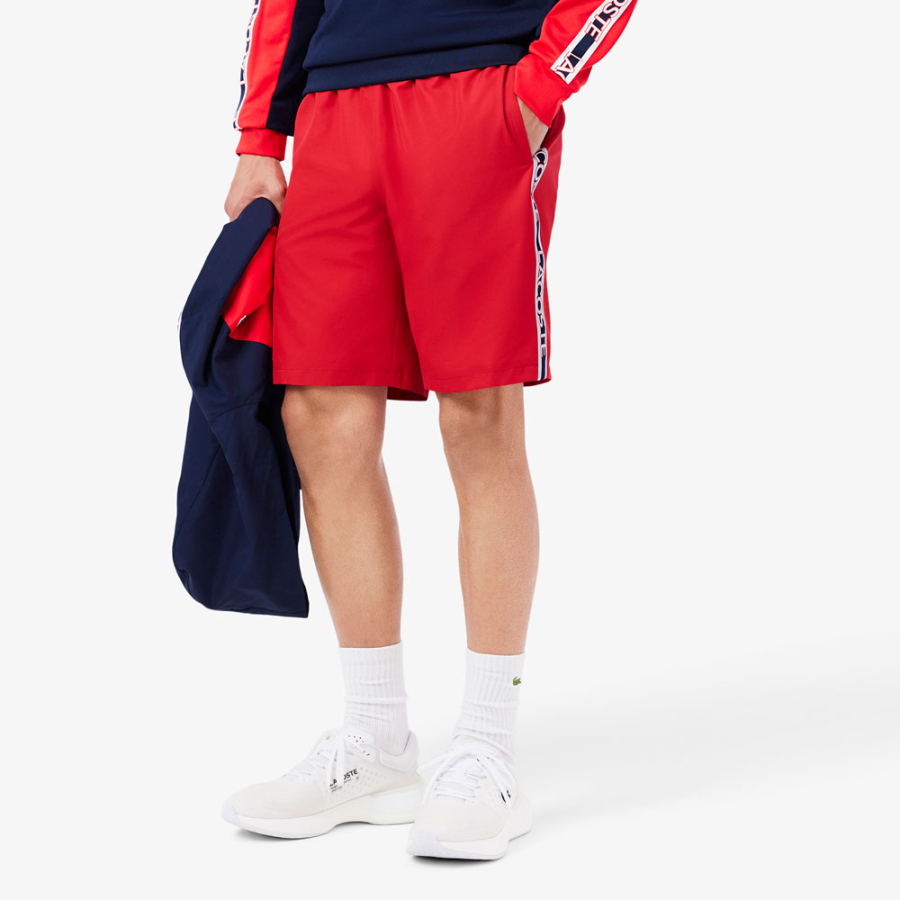 shorts-a-righe-con-logo-sportivo shorts-a-righe-con-logo-sportivo