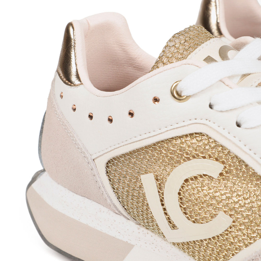 tenis-com-solado-personalizado-e-detalhes-dourados tenis-com-solado-personalizado-e-detalhes-dourados