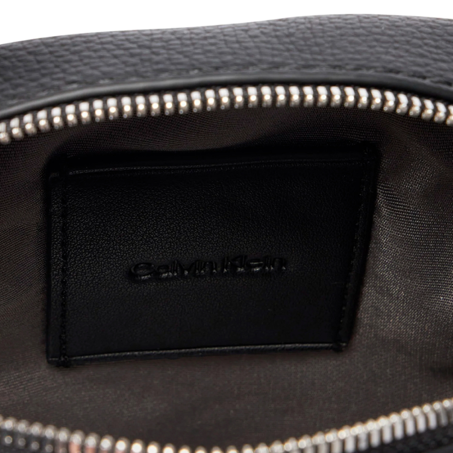 emblem-slim-reporter-crossbody-bag